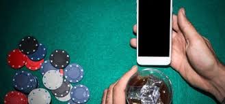 Tampilan permainan Bonanza Gold dengan grid emas dan simbol-simbol bersinar